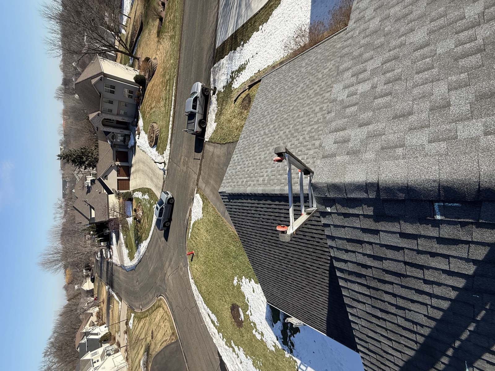 Completed roof with new architectural shingles