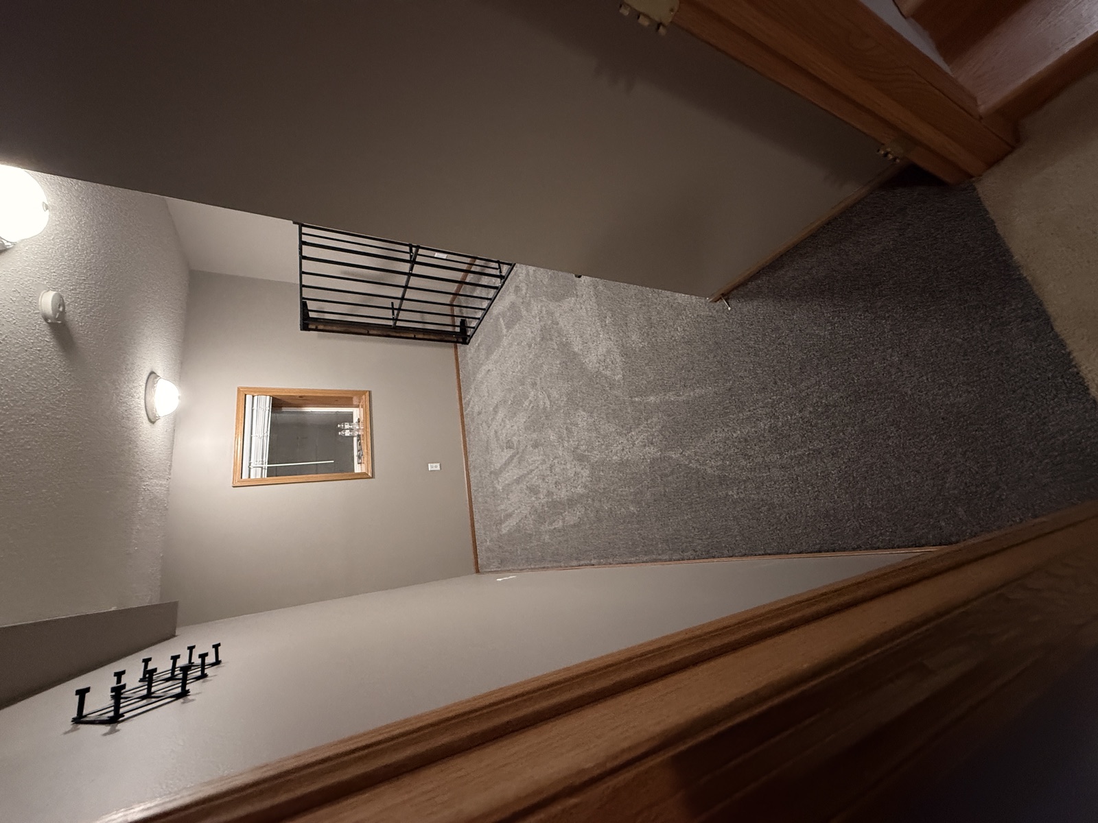 Finished lower level with new carpet, painted walls and trim