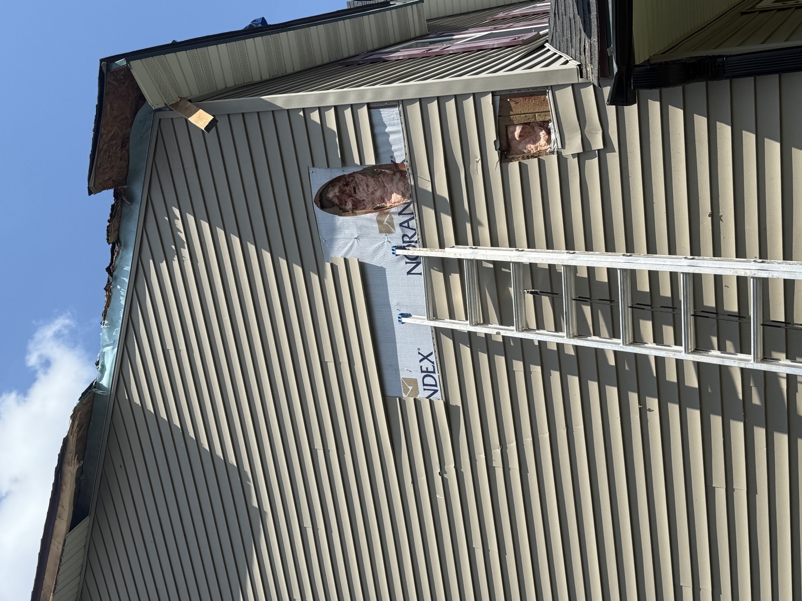 Siding installation in progress